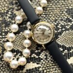 OMEGA 18k guld damur